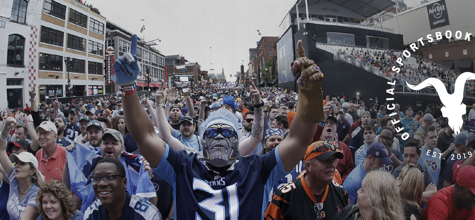 An NFL street-party crowd — a fan in team colours and face paint cheering, with the BlitzBet seal
